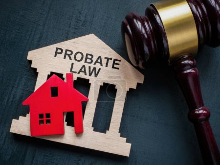 Probate law concept. Gavel and a house model.