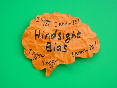 Photo for A Brain made of paper with inscription Hindsight bias. - Royalty Free Image