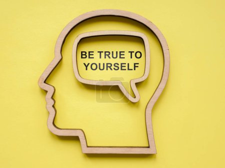 Photo for Wooden head and quote Be true to yourself. - Royalty Free Image
