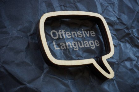 Offensive language. Speech bubble on crumpled paper.