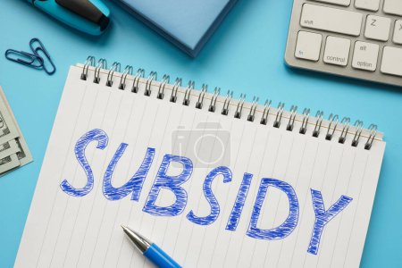 Photo for Written word subsidy in notepad. - Royalty Free Image