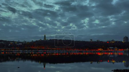 Photo for Power cuts in Kyiv after fresh missiles attacks on grid by Russia. Emergency blackouts in Kyiv. October 2022 - Royalty Free Image