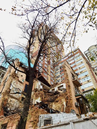 Photo for KYIV, UKRAINE - October 22, 2022: Civilian house after a drone attack on buildings in Kyiv. Waves of explosive-laden suicide drones struck Ukraines capital as families were preparing to start their - Royalty Free Image