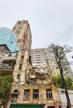 Photo for KYIV, UKRAINE - October 22, 2022: Civilian house after a drone attack on buildings in Kyiv. Waves of explosive-laden suicide drones struck Ukraines capital as families were preparing to start their - Royalty Free Image