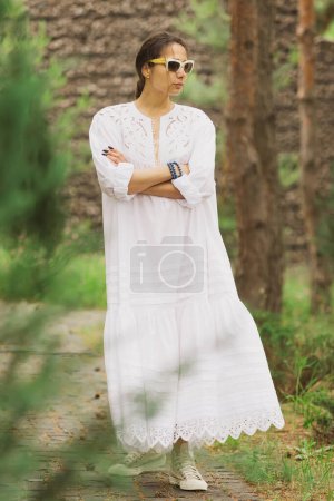 Photo for Beautiful young woman in elegant dress outdoors. - Royalty Free Image