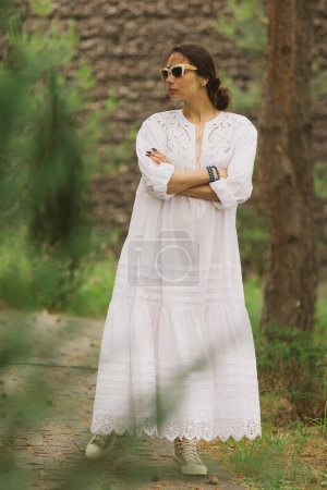 Photo for Beautiful young woman in elegant dress outdoors. - Royalty Free Image