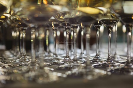 Photo for Glasses with white and red wine. Catering services. Glasses with wine in row background at restaurant party. Shallow dof. - Royalty Free Image