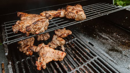 Photo for Beef steaks on the grill. Shallow dof. - Royalty Free Image