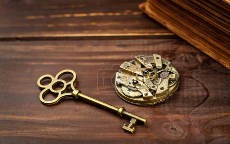 Old vintage golden clockwork and key, escape room game background