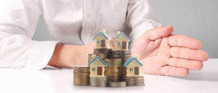 Photo for House Residential Structure in hand ,business home idea, model house and coin - Royalty Free Image