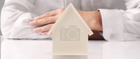 Photo for House Residential Structure in hand ,business home idea, model house - Royalty Free Image