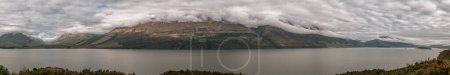 Photo for Panoramic view of cloud covered mountains above Lake Wakatipu from Bennetts Bluff viewpont between Queenstown and Glenorchy - Royalty Free Image