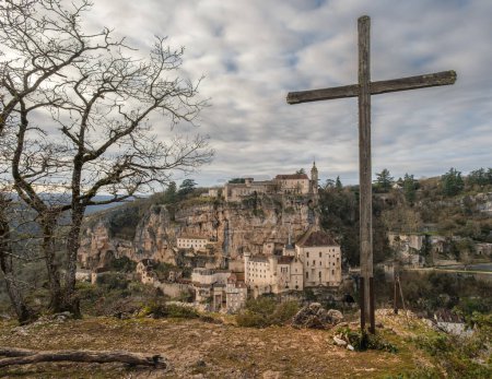 Photo for Croix de Cufelle is a large wooden cross overlooking the medieval city of Rocamadour in the Lot region of France - Royalty Free Image