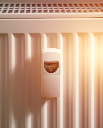 Photo for Heater calorimeter on a white radiator - Royalty Free Image