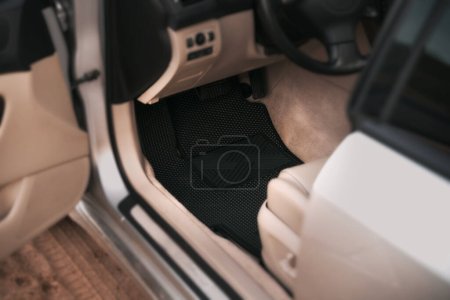 Téléchargez les photos : Black EVA car floor mat first row - en image libre de droit