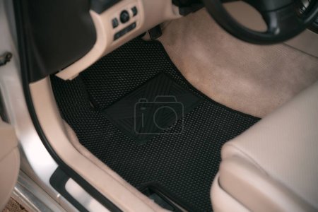 Téléchargez les photos : Black EVA car floor mat first row - en image libre de droit