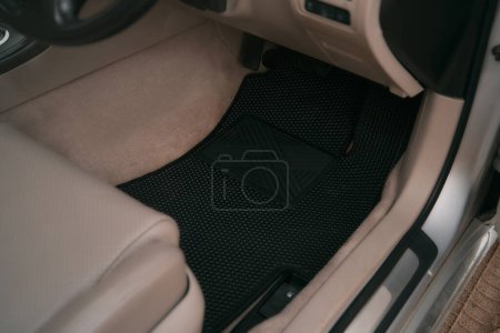 Téléchargez les photos : Car interior with honeycomb vinyl floor mat. - en image libre de droit