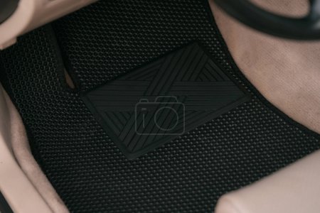 Foto de Black EVA car floor mat first row - Imagen libre de derechos