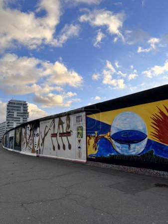Photo for Berlin, Germany, Europe- December 27, 2022: Berlin Wall was a barrier constructed starting on 13 August 1961. East Side Gallery is an international memorial for freedom - Royalty Free Image
