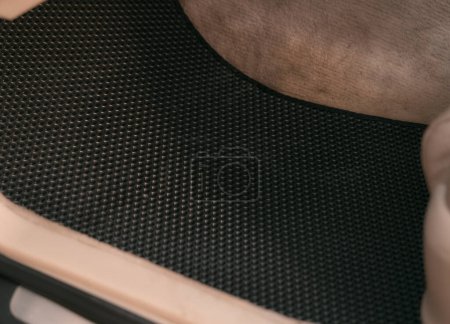 Foto de Black EVA car floor mat first row - Imagen libre de derechos