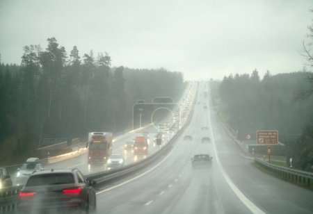 Photo for 16.04.2023 Germany, Europe. Heavy Traffic Congestion on Autobahn in Rainy Weather. Overloaded Opposite Lane and Slow-moving Commuters during Rush Hours in Germany. - Royalty Free Image