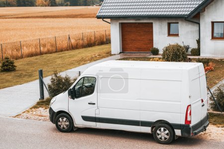 Photo for Parcel logistics concept. Efficient Delivery Services. White Van Showcases Door-to-Door Parcel Logistics - Royalty Free Image