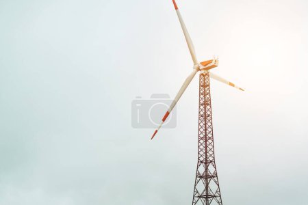 A Wind Turbine Captures Energy Amidst a Cloudy Sky