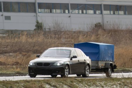 Photo for A Smart Solution for Transporting Your Cargo. Rent a Car and a Trailer - Royalty Free Image