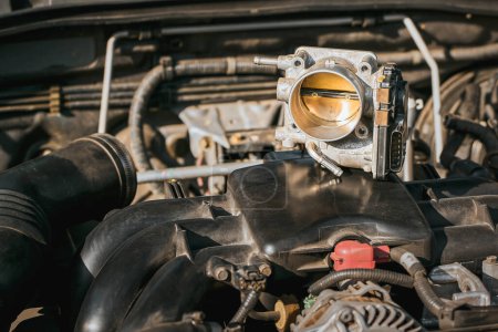 Electronic throttle body repair in car engine