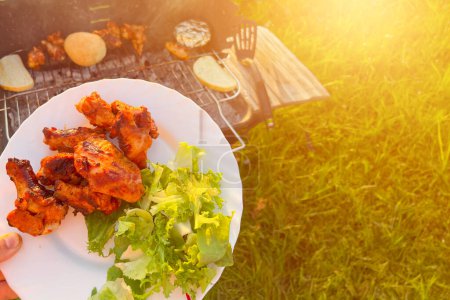 Outdoor Barbecue Delights: Savor the Flavor of Grilled Chicken and Greens