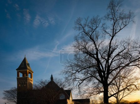 Photo for Late evening church and silhouette with dramatic sky in Rock Hill, South Carolina. - Royalty Free Image