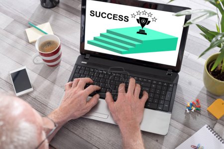 Photo for Success concept shown on a laptop used by a man - Royalty Free Image