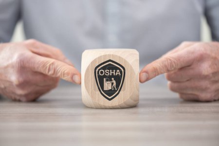 Téléchargez les photos : Bloc en bois avec symbole du concept osha - en image libre de droit