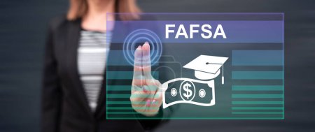 Woman touching a fafsa concept on a touch screen with her fingers