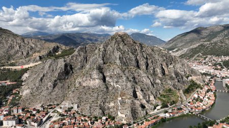 Photo for A photo of Amasya old city center taken with a drone. Traditional houses located on the banks of the Yesilirmak River. - Royalty Free Image