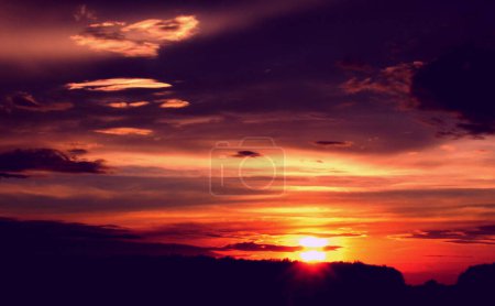 Photo for Sunset with beautiful clouds and unusual color. - Royalty Free Image