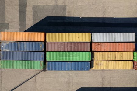 Photo for Top down view of colorful containers piles in port container terminal, industrial cargo harbor - Royalty Free Image
