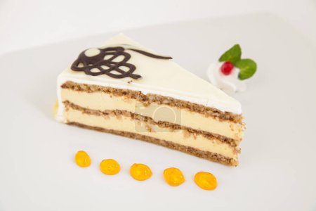 Foto de Tasty cake slice on plate, decorated. Valentines or birthday party. - Imagen libre de derechos