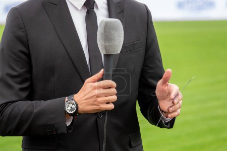 Photo for News journalist with microphone interviewing - Royalty Free Image