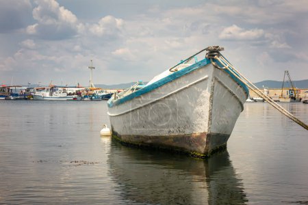 Photo for Old wooden fishing boat in port of nessebar, ancient city on the Black Sea coast of Bulgaria - Royalty Free Image