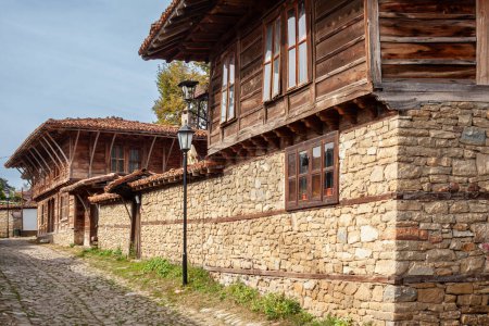 Photo for Old wooden houses in Zheravna (Jeravna). The village is an architectural reserve of Bulgarian National Revival period (18th and 19th century) - Royalty Free Image