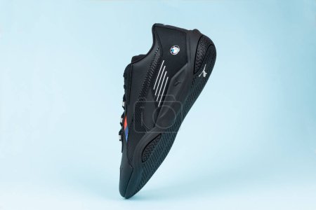 Photo for Varna , Bulgaria - OCTOMBER 14, 2021 PUMA BMW MOTORSPORT sport shoe. Puma is a German company. PUMA is the third largest sportswear manufacturer in the world. Product shots - Royalty Free Image
