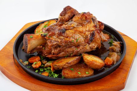 Photo for Roasted pork leg (knuckle) with vegetables - Royalty Free Image