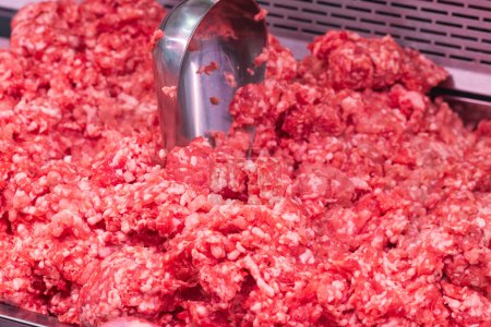 Minced meat  in butcher shop. Ground pork ready for sale at market.