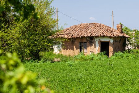 Photo for Old abandoned village house. Exterior - Royalty Free Image