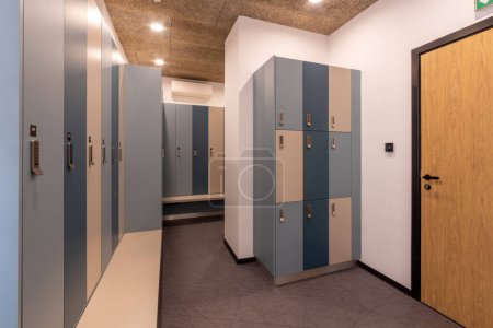 Photo for Interior of empty changing room, locker room, Dressing room in swimming pool or gym - Royalty Free Image