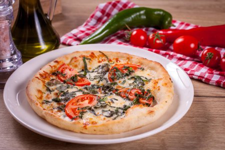 Photo for Close up of delicious italian pizza with vegetables & cheese. - Royalty Free Image