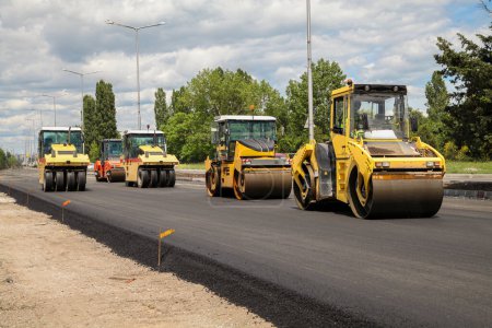 Photo for Group of heavy vibration roller compactors. Asphalting. Road construction - Royalty Free Image