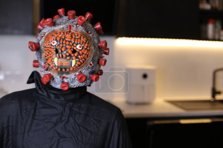 Photo for Close-up shot of person in covid mask at home - Royalty Free Image