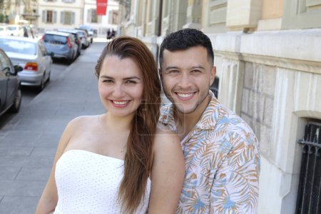 Photo for Portrait of young happy couple on city street together - Royalty Free Image
